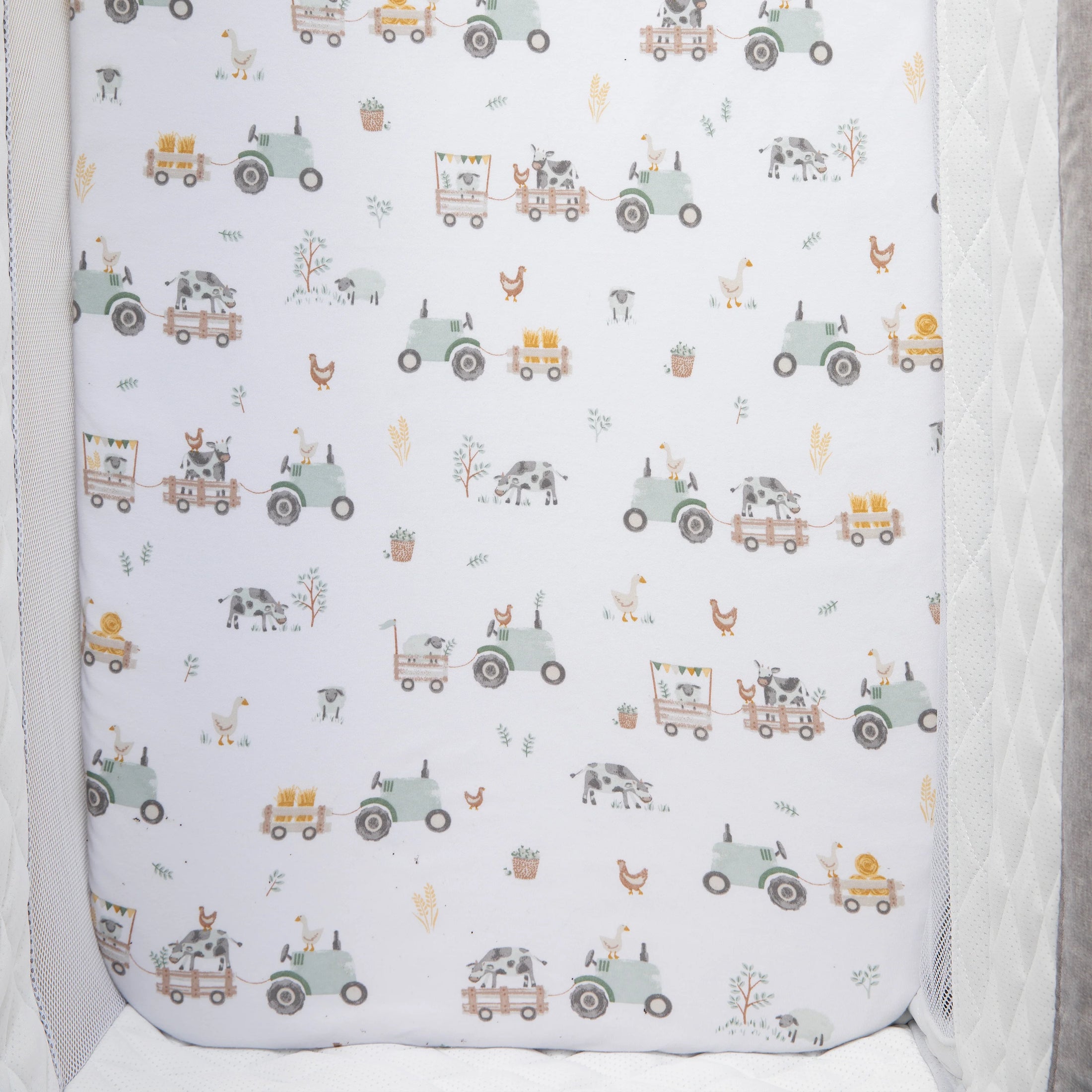 Living Textiles 1pk Organic Jersey Bedside Sleeper Fitted Sheet - Tractor Ride
